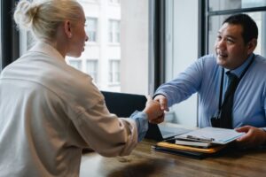 screening new hires with background checks handshake