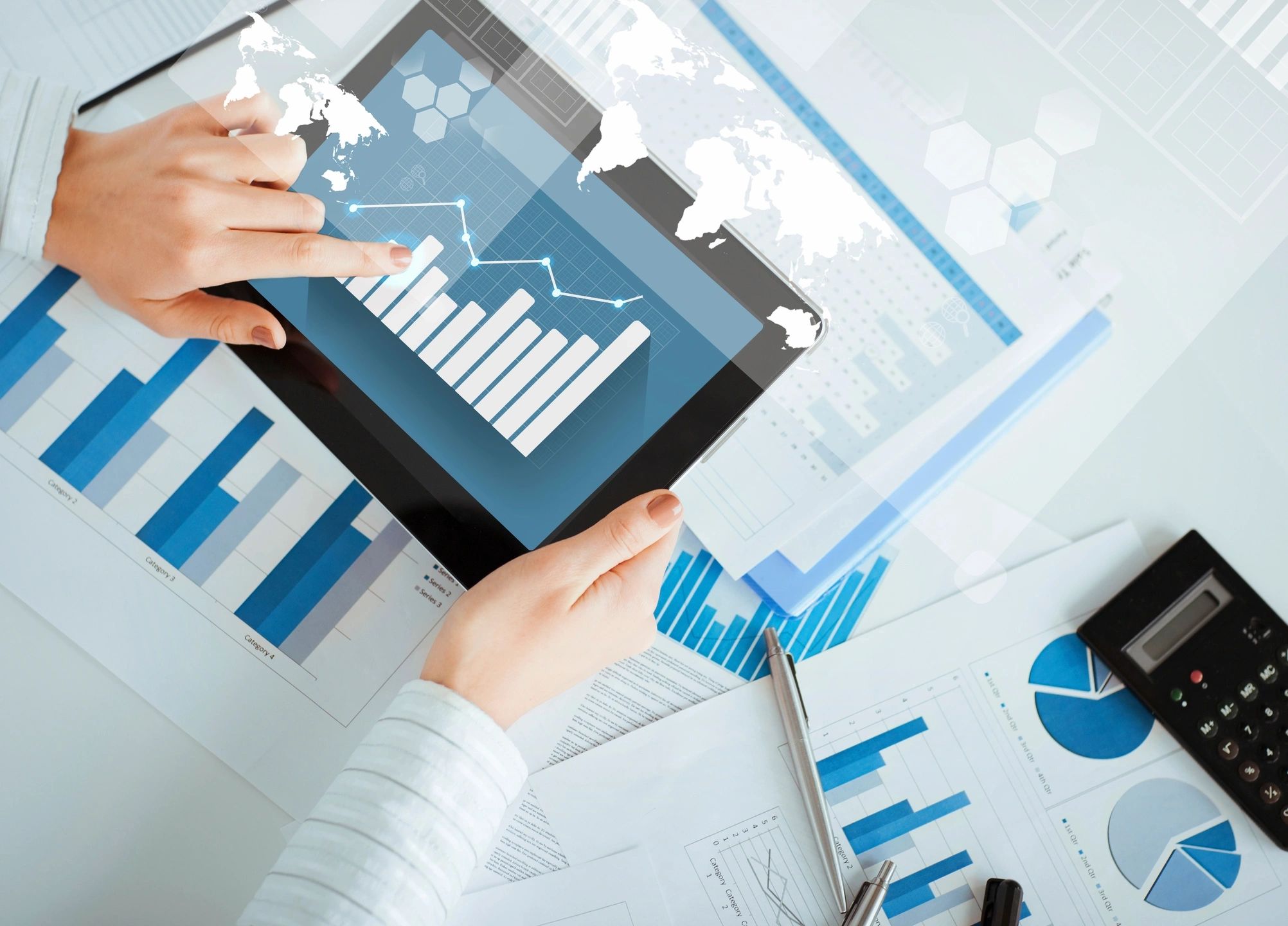 Person checking tablet for reports
