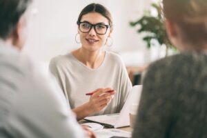 Business owner meeting with employees