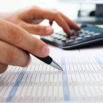 Calculating taxes with a calculator
