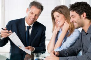 Businesspeople meeting to review documents