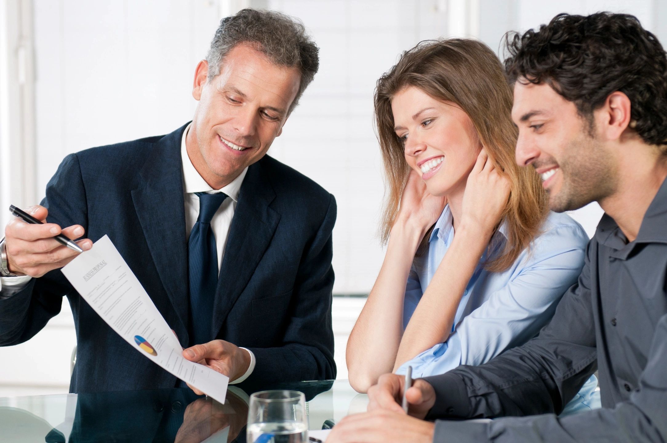 Businesspeople meeting to review documents